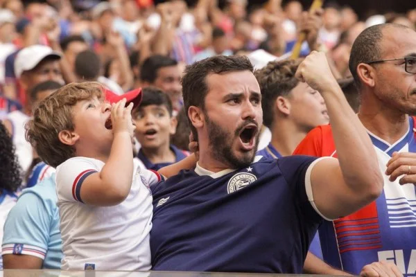 young football fan celebrating